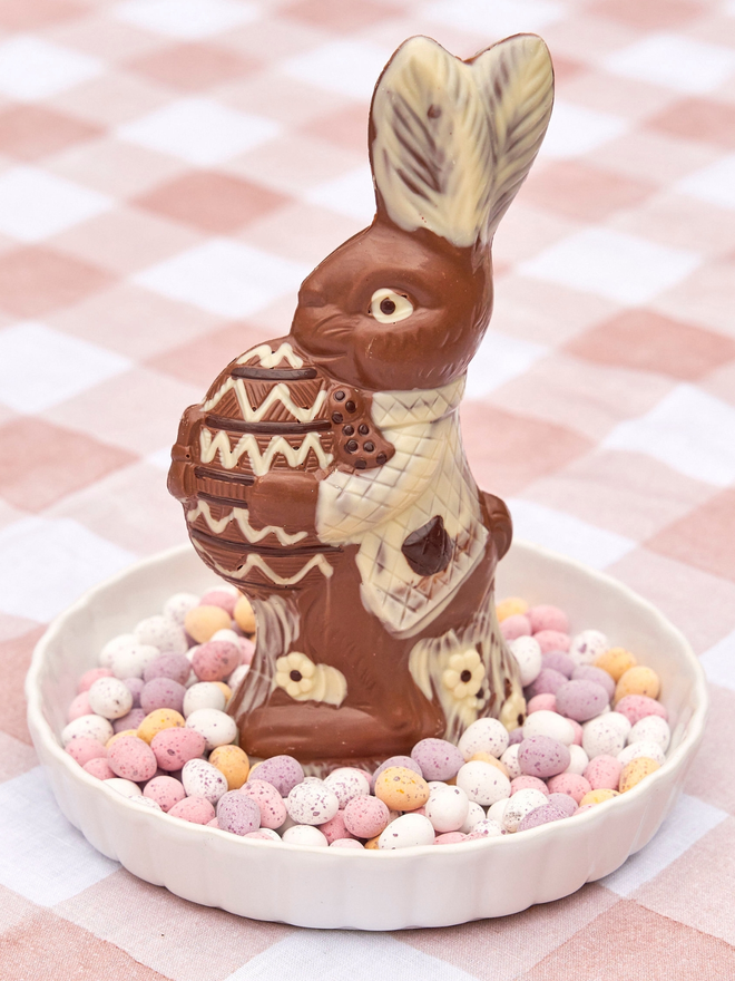 Easter bunny with chocolate egg
