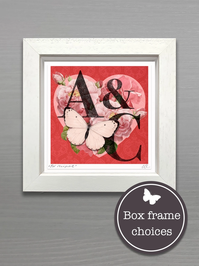  A handmade Ruby anniversary card featuring two initials of a couples names, place inside a heart design with vintage roses and on a red background. The recipients initials are hand written on the front of card and hand signed, A pink 3D paper cut butterfly sits on the heart and wings can be folded out for display in a white square box frame.