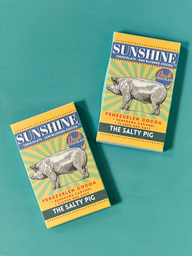 two chocolate bars with pig design