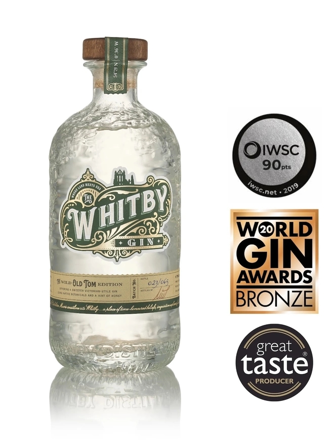 Wild Old Tom Edition Gin, a bottle of gin sitting on a plain white surface. 