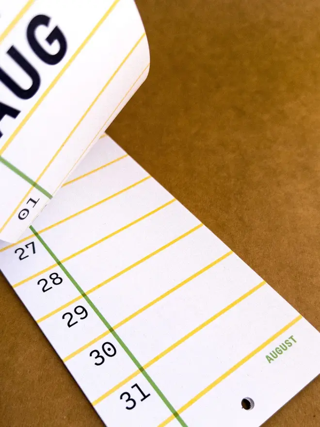 Closeup of Perpetual Squared: Birthday, Anniversary, Memory Tracker, showing month name in header and footer