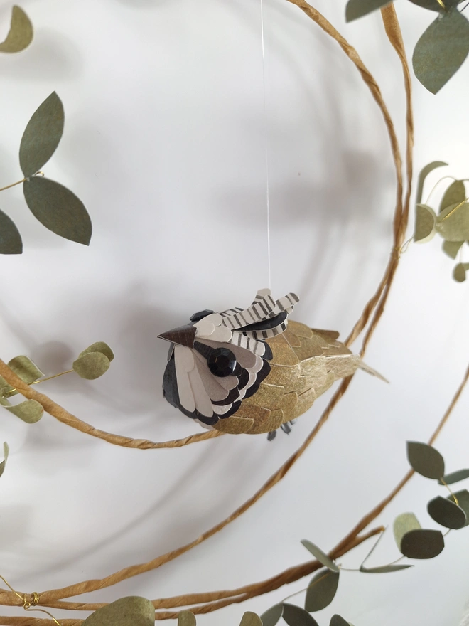 handmade paper sculpture of a crested tit