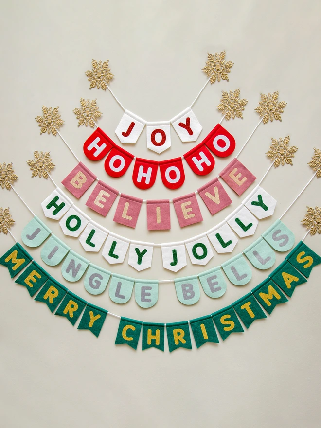 a range of glittery christmas bunting