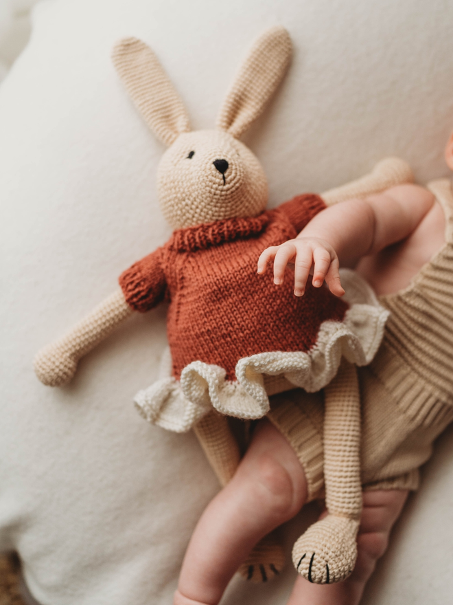 hand crochet bunny with red and white hand knit dress lifestyle shot