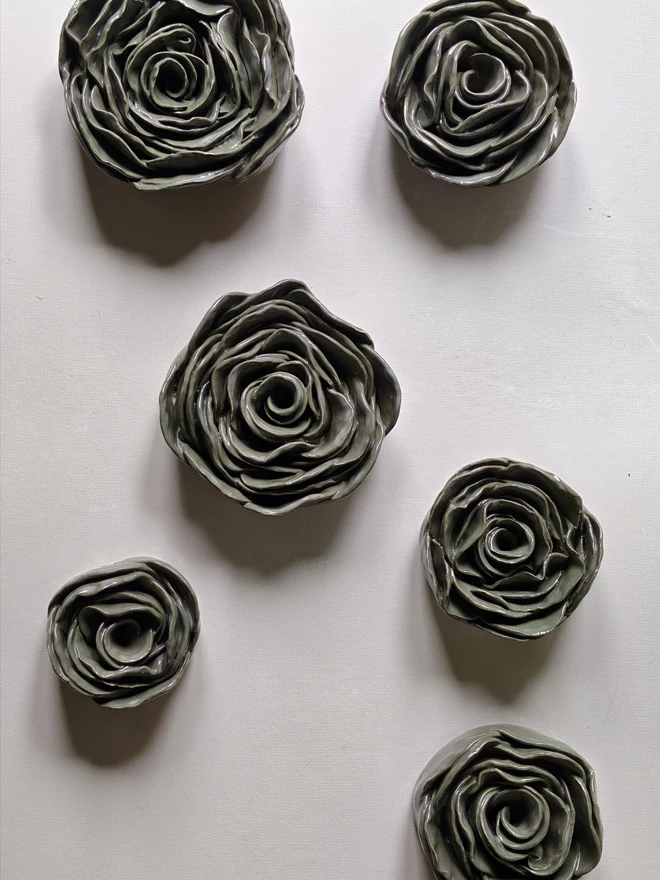dark green glazed handmade ceramic roses
