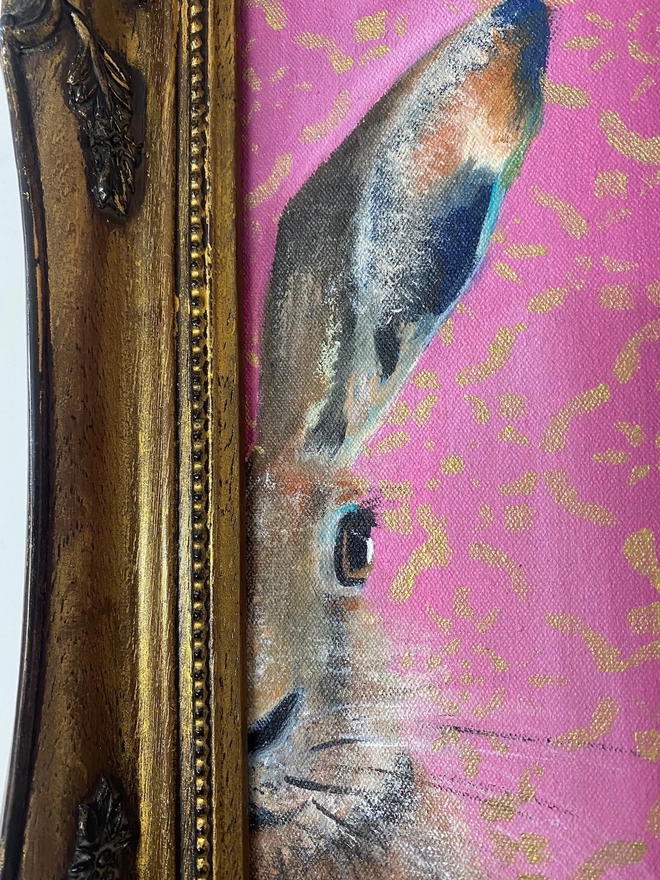 Splitting hares painting in gold frame detail