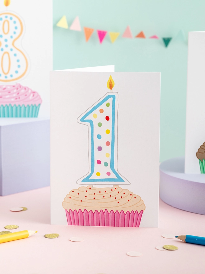 A Sweet 1st Birthday Card Featuring a Cupcake and Candle