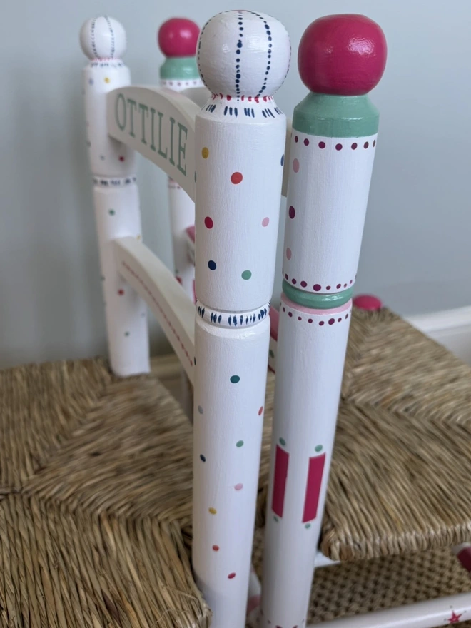 White wooden rush chairs for children, hand painted. 