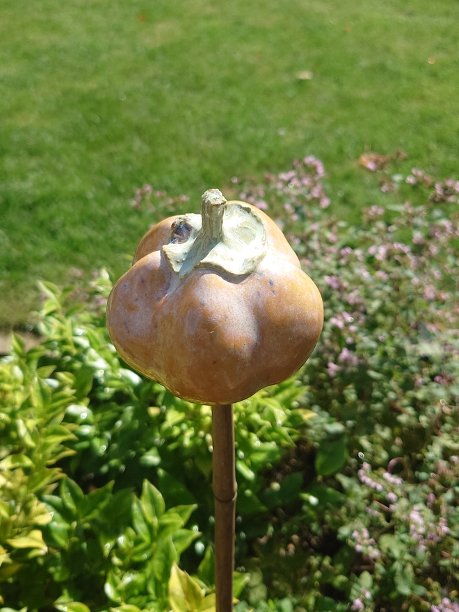 Stoneware pumpkin garden cane topper