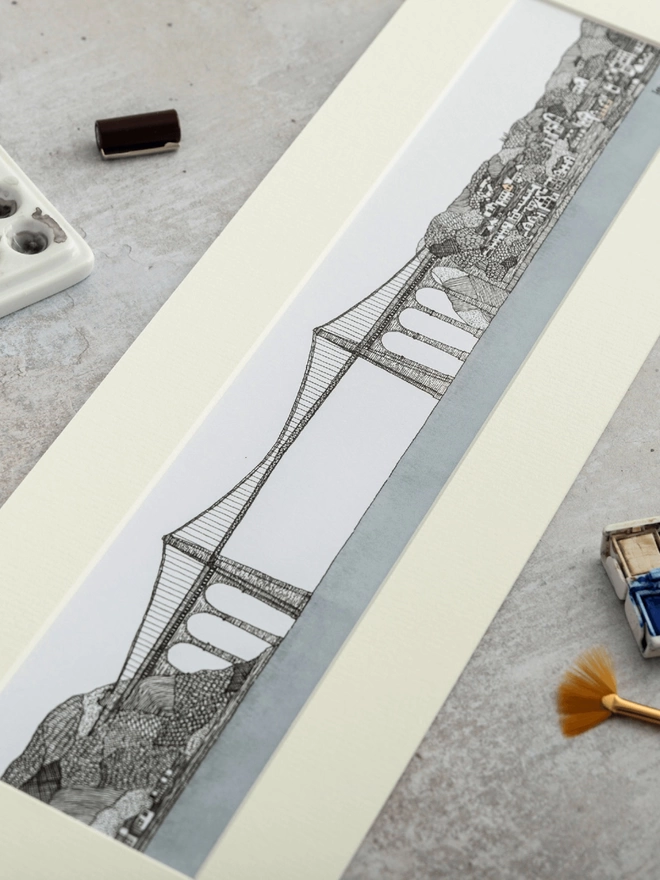 Print of a detailed pen and watercolour drawing of the Menai Bridge, North Wales in a soft white mount