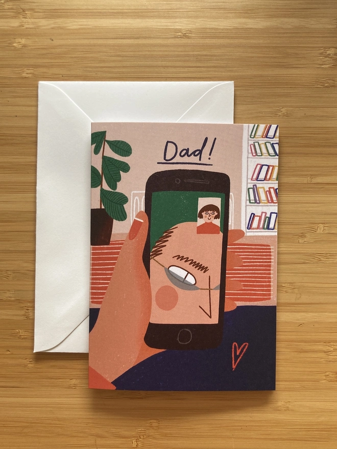 Illustrated card of someone holding a phone, with an image of just their Dad's forehead on FaceTime. The text says 'Dad!'