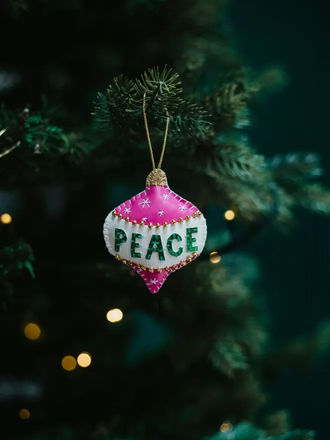 Hetty and Dave hand-stitched Peace christmas decorations.