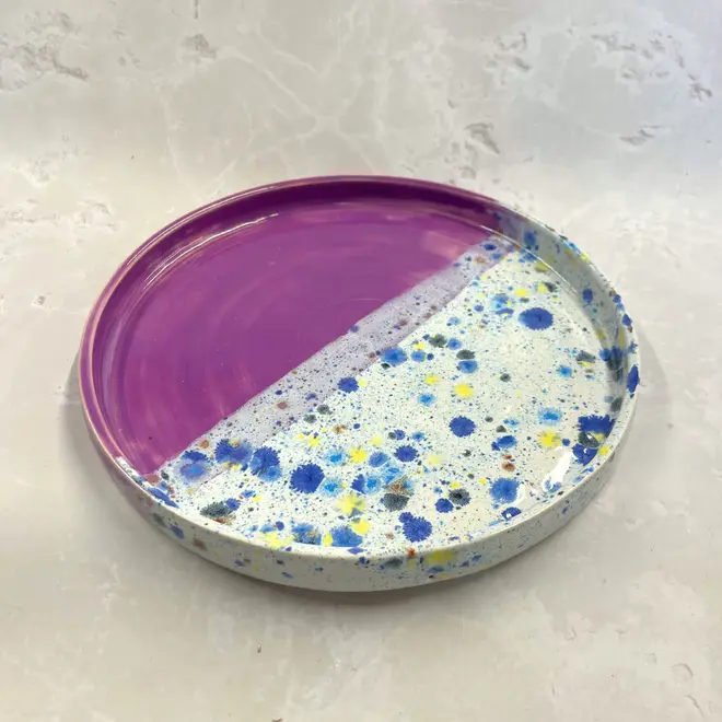 Shoreline Tray, a colourful tray placed on a stone surface. 