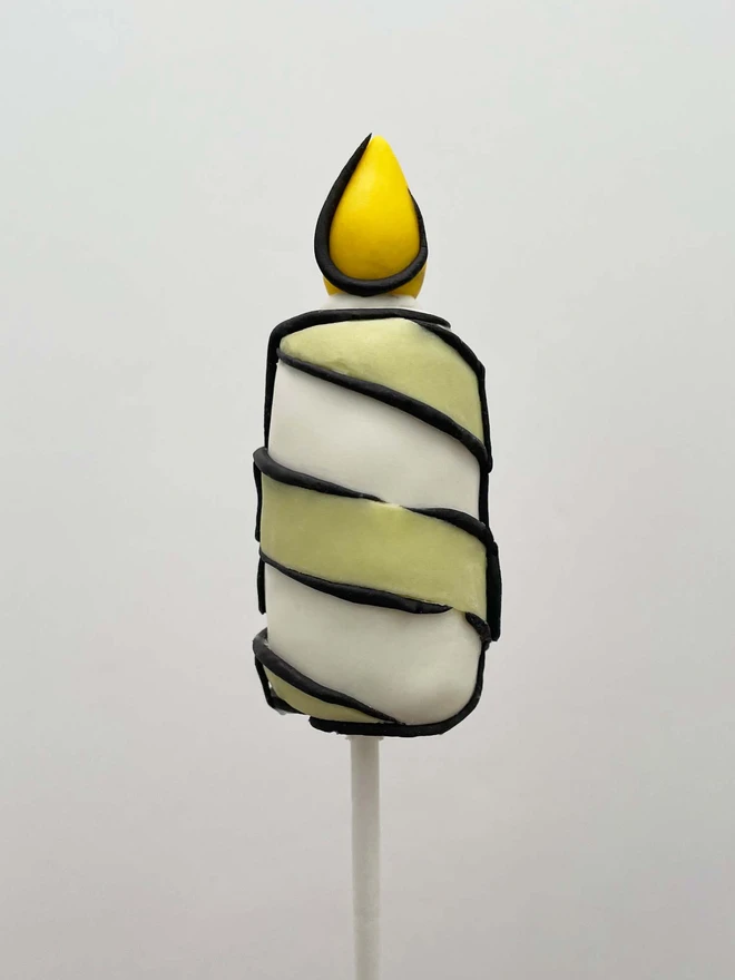 Cartoon Birthday Candle Cake Pops (Pack Of 6, 12, 18, 24), Birthday candle cake pop decorated in green swirl placed in front of a white background.