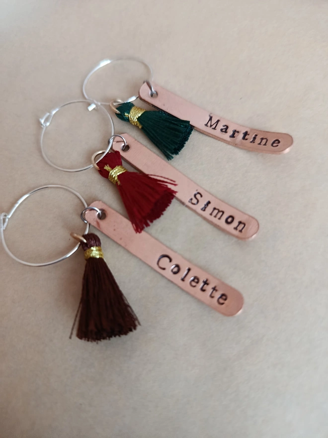 Personalised glass charms on copper with dark tassels
