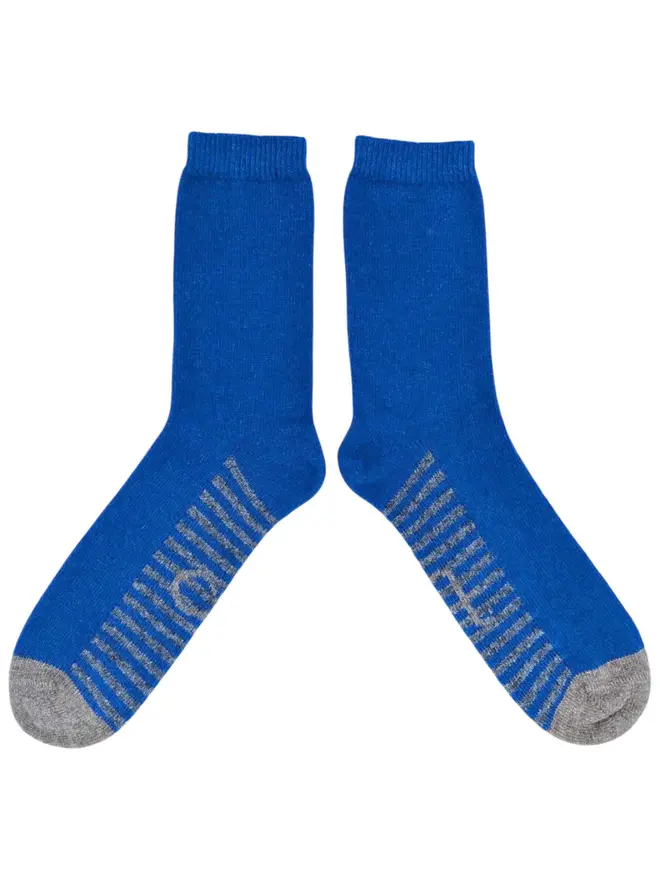 Men's Organic Cotten Striped Arch Ankle Socks, a pair of colourful patterned socks sitting on a plain white surface. 