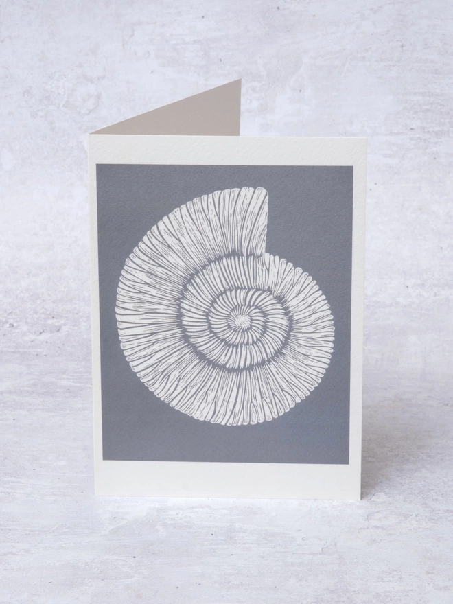 Greeting Card with an image of an Ammonite Fossil taken from an original lino print