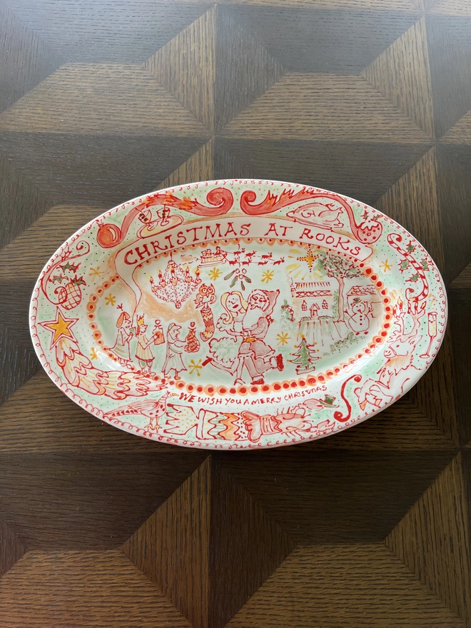 Christmas Platter - highly personalised and bespoke. Humorous and illustration style, in green, red and orange for festive feels. House and couple complemented by festive motifs. Full of Christmas Cheer!