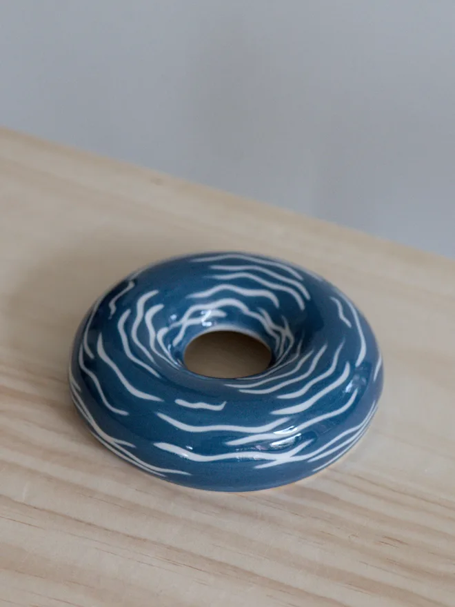 Avocado Planter White & Blue Handmade porcelain avocado planter with carved blue pattern, designed to hold an avocado seed for sprouting