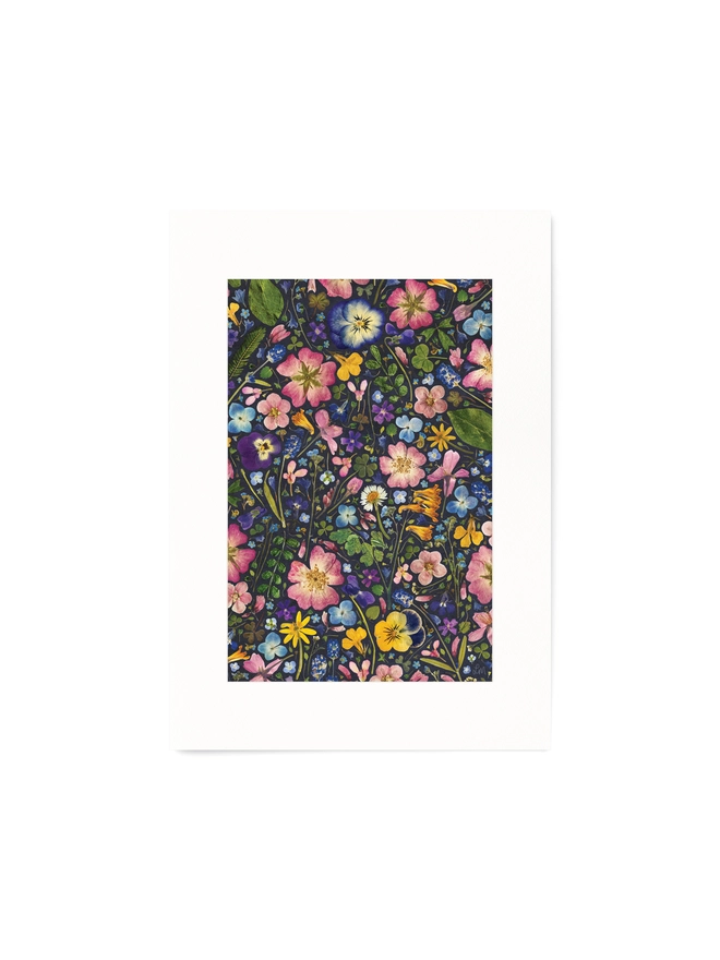A4 Pressed Flowers Art Print on a dark ink background.