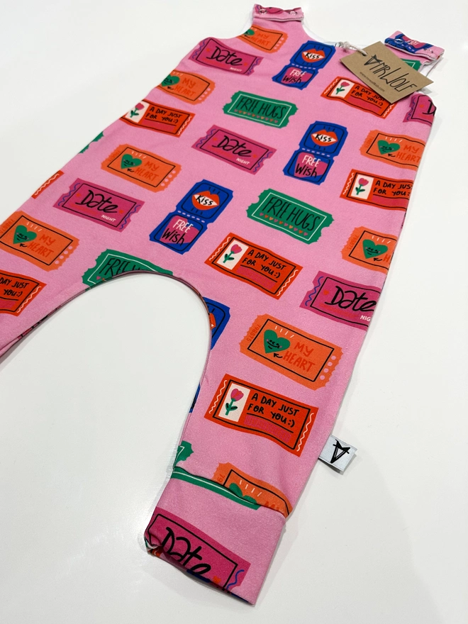 Valentines baby romper in love tokens print fun baby romper colourful and bright