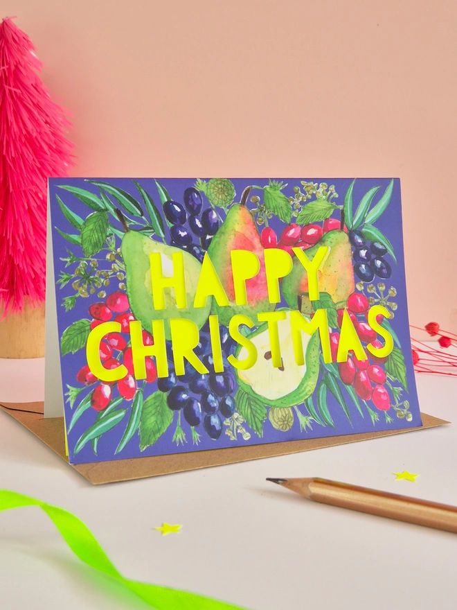 Pear illustration christmas card with Happy Christmas text, backed with neon yellow paper 