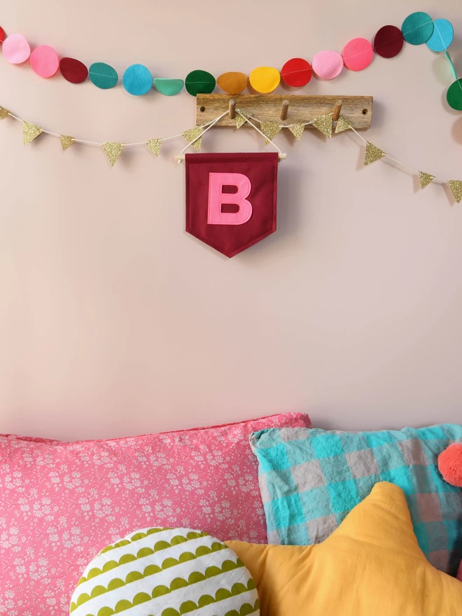mini banner with initial on for kids room.