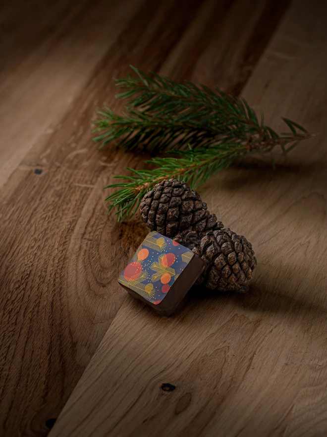 Black square chocolate with festive pattern chocolate