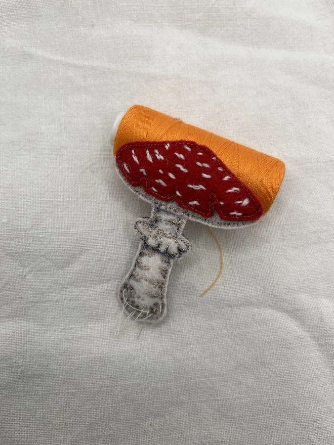 brooch one with reel