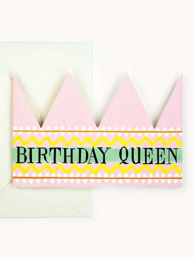 pink and yellow paper crown card with birthday queen text