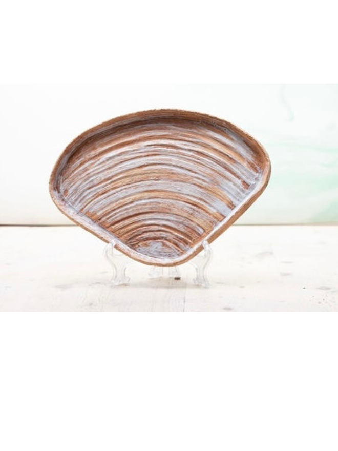 Ceramic shell plate
