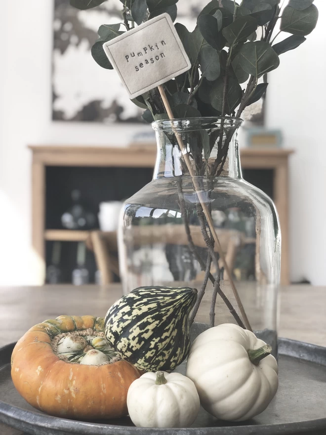 Halloween Embroidered Sign in a vase with pumpkins