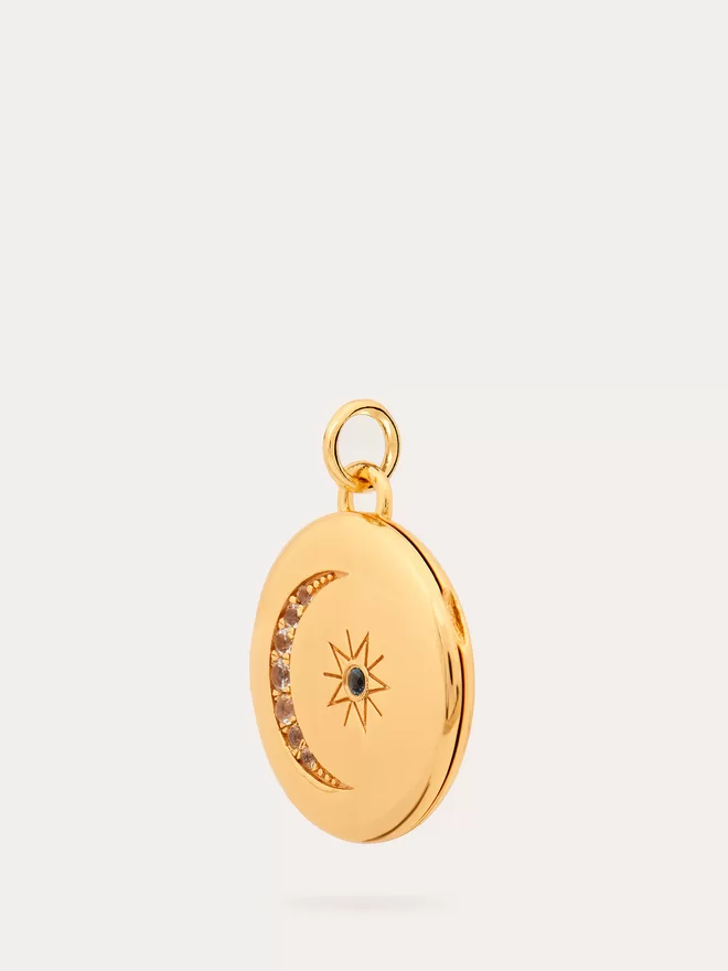 side view of gold Moon and Star Locket.