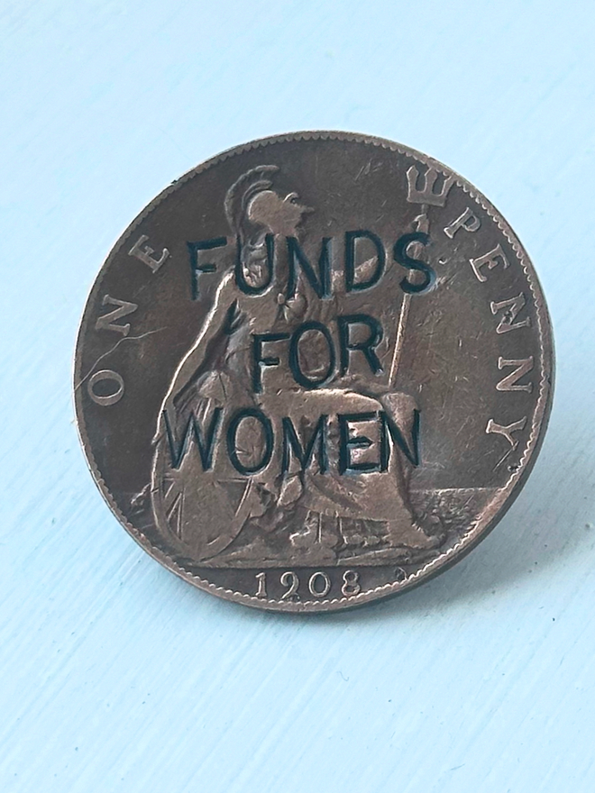 'Funds For Women' Stamped Coin