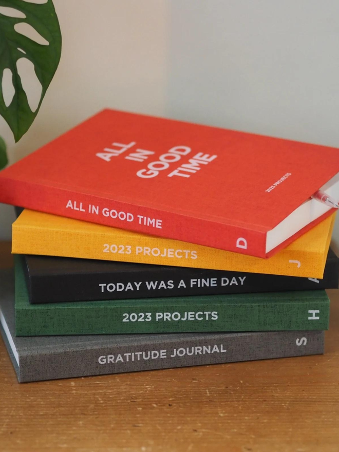 personalised hardcover notebook stack