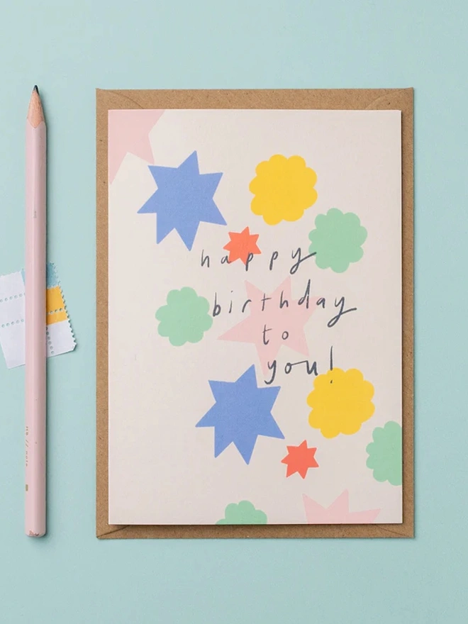 A sweet birthday card featuring colourful shapes. 