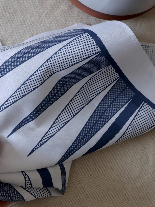 detail of a Mr.PS Backgammon Hankie printed in midnight blue