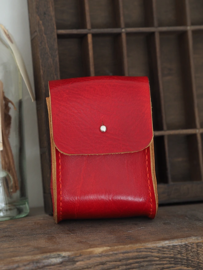 Handmade Leather Double Deck Playing Card Holder. Hand dyed red leather pouch carrying two brand new packs of playing cards.
