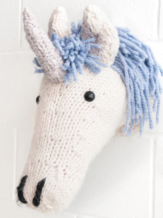 Unicorn Head Knitting Kit. A giant unicorn head in cream and blue