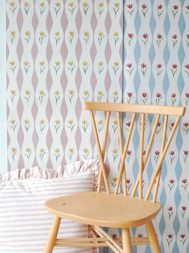 Tulip wave wallpaper (rose) room setting with wooden chair and cushion
