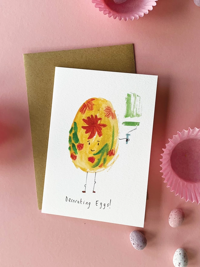 Decorating Eggs Easter Card Featuring A Painted Egg Holding A Decorators Paint Roller 