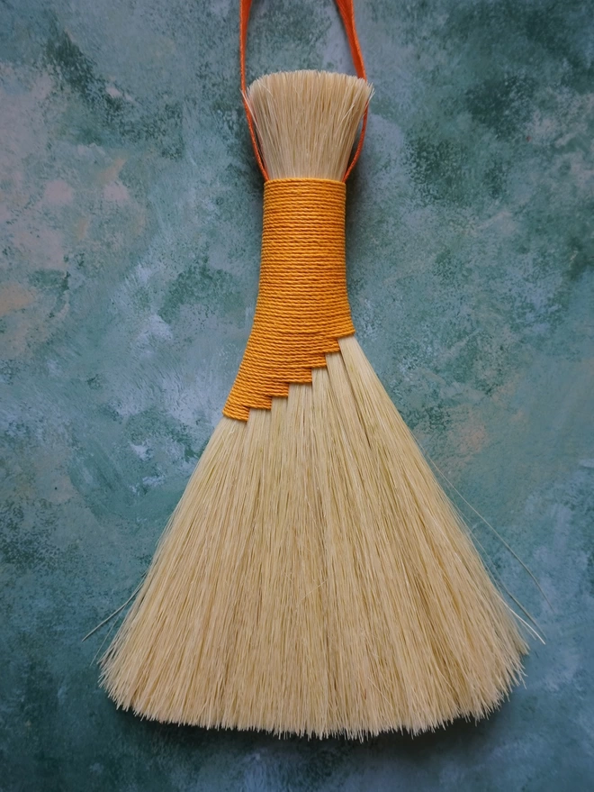 Handmade tampico brush with gold hemp cord binding
