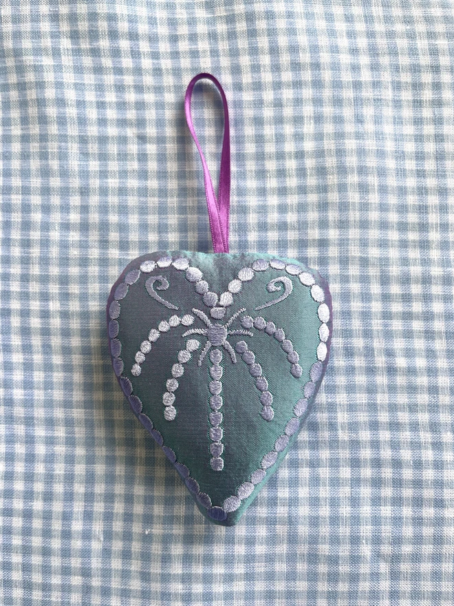 Silk heart ornament: pale blue silk, pale blue thread, purple ribbon