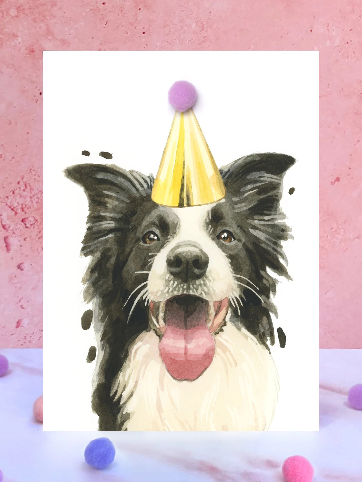Border Collie Pompom Birthday Celebration Collection Card in front of a pink background and surrounded by pompoms