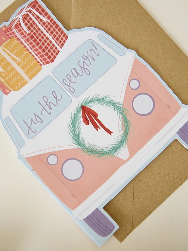Illustrated festive camper van cutout Christmas card 