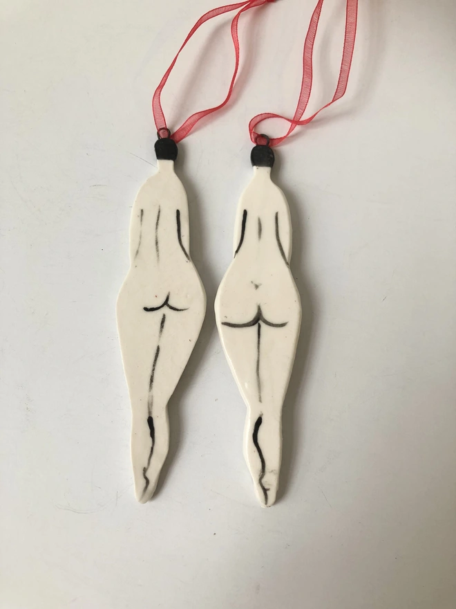 The other side of the naked lady hanging decoration