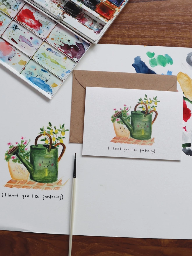 Gardening Greeting Card with a Watercolour illustration of a green Watering Can with a smiley face