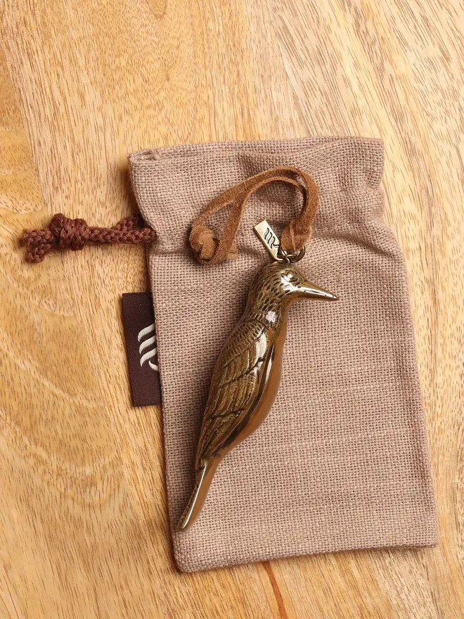 woodpecker hanging decoration on linen gift bag