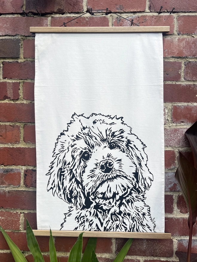 Full image of cockapoo dog tea towel with the cockapoos head printed in the bottom half
