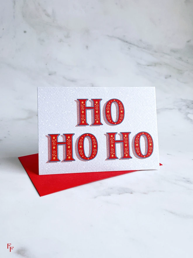 'Ho Ho Ho' charity christmas card, Typography, Lettering, blue and red, vintage aesthetic, flora fricker